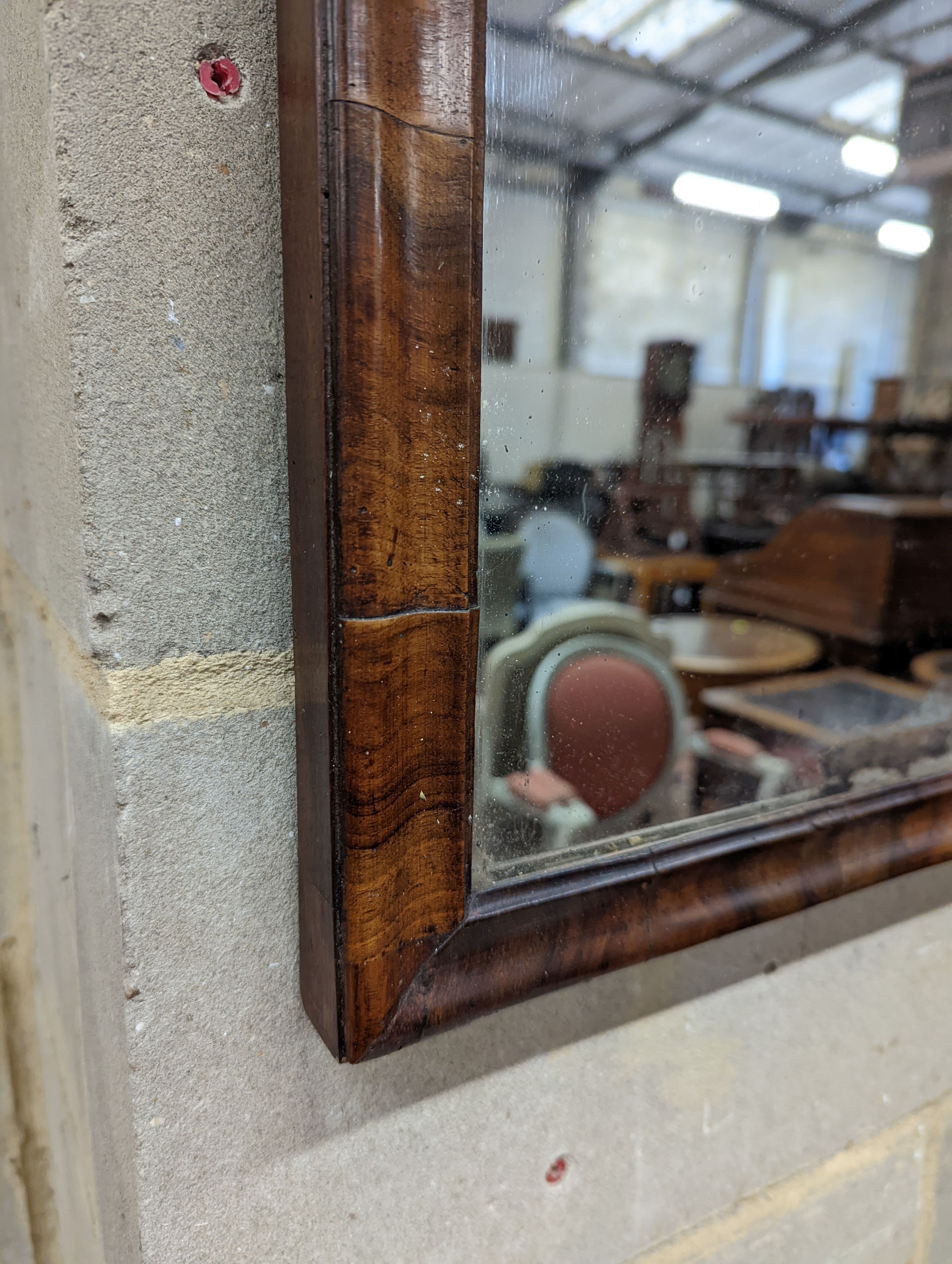 An 18th century walnut wall mirror, width 37cm, height 58cm